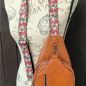 Stylish Tan Backpack with Floral Strap